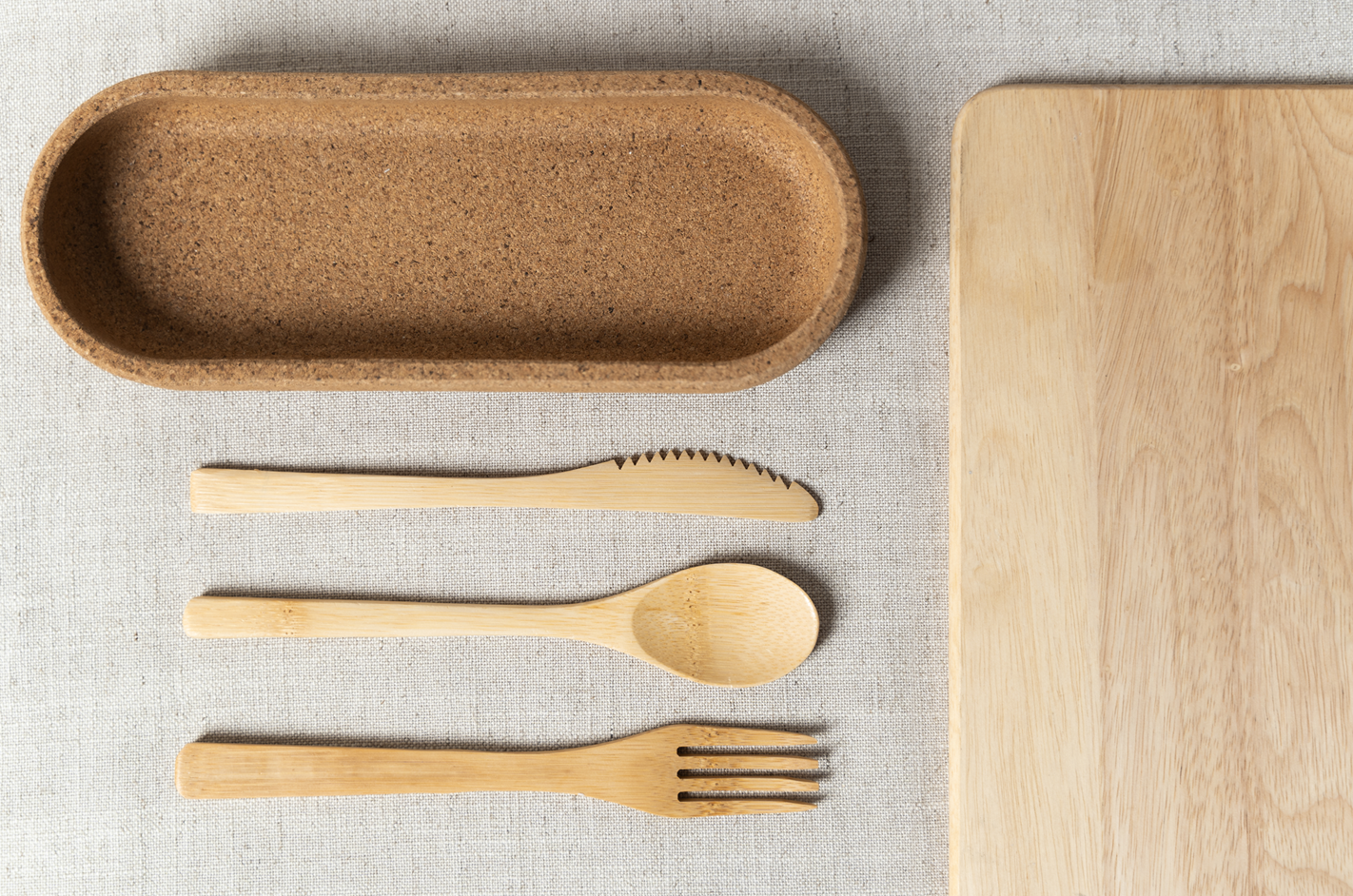 Elegant sustainable table setting with Flora Dine bagasse plates, bowls, and fresh natural food